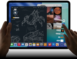 iPad Pro, vesmírně černá barva, levá ruka drží zařízení, pravá ruka ukazuje a gesty ovládá okna různých otevřených aplikací, aplikace na kreslení s náčrtky mechanických strojů, knihovna fotek se snímky planet a vesmíru, rozložené zobrazení souborů ve složce stahování